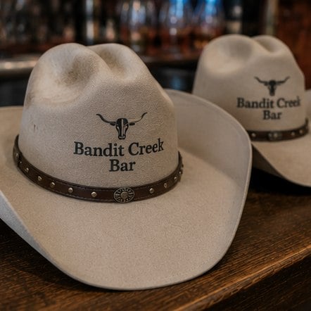 Branded cowboy hats with logo on the band
