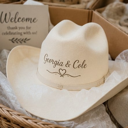 Personalized wedding cowboy hats in a welcome display